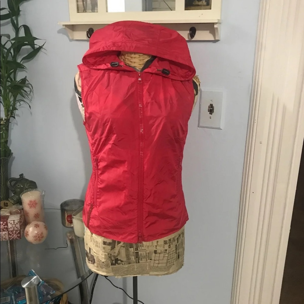 Red Prada windbreaker material vest.